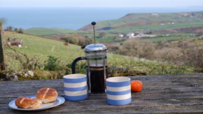 Polrunny Farm Elderberry Cottage with sea view